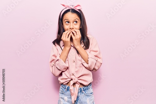 Slika na platnu Beautiful child girl wearing casual clothes laughing and embarrassed giggle cove