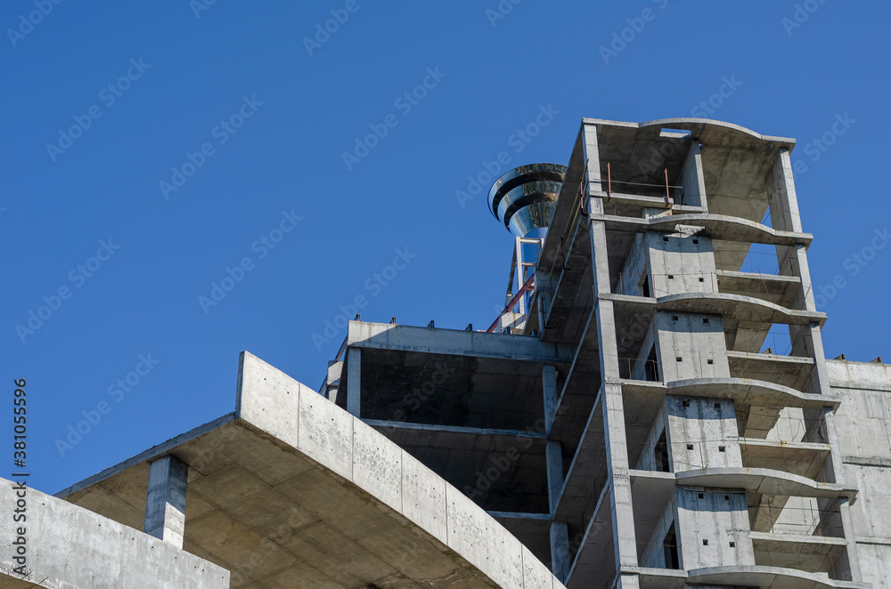 Concrete building of an unfinished skyscraper.