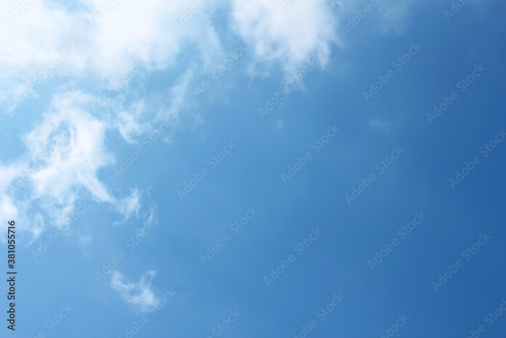 bright cumulus cloud and blue sky