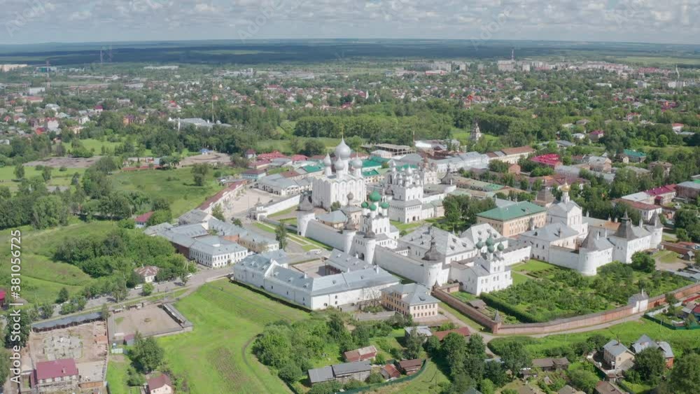 Cinematic aerial video of old Assumption Cathedral in Kremlin of Rostov Veliky in Yaroslavl Oblast in Russian Federation. Beautiful summer sunny look of orthodox temple in center of ancient fortress Cinematic aerial video of old Assumption Cathedral in Kremlin of Rostov Veliky in Yaroslavl Oblast in Russian Federation. Beautiful summer sunny look of orthodox temple in center of ancient fortress