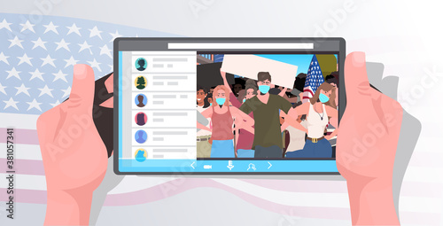 human hands using tablet pc watching online video people in masks holding usa flags labor day celebration coronavirus quarantine self isolation concept horizontal portrait vector illustration