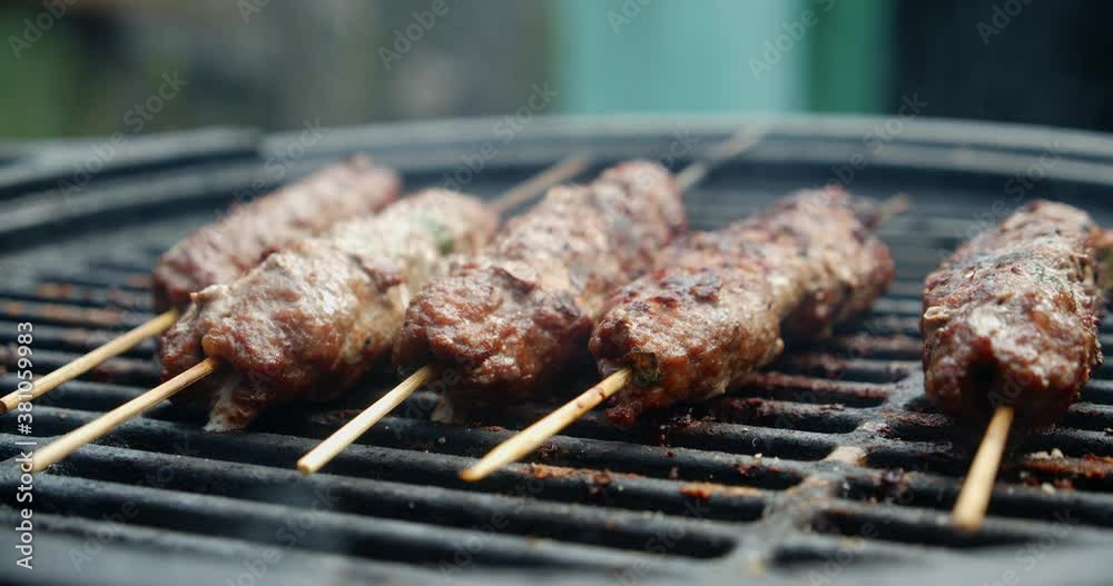 Kebab is grilled on a stick with smoke. Kebab is grilled on a stick with smoke.
