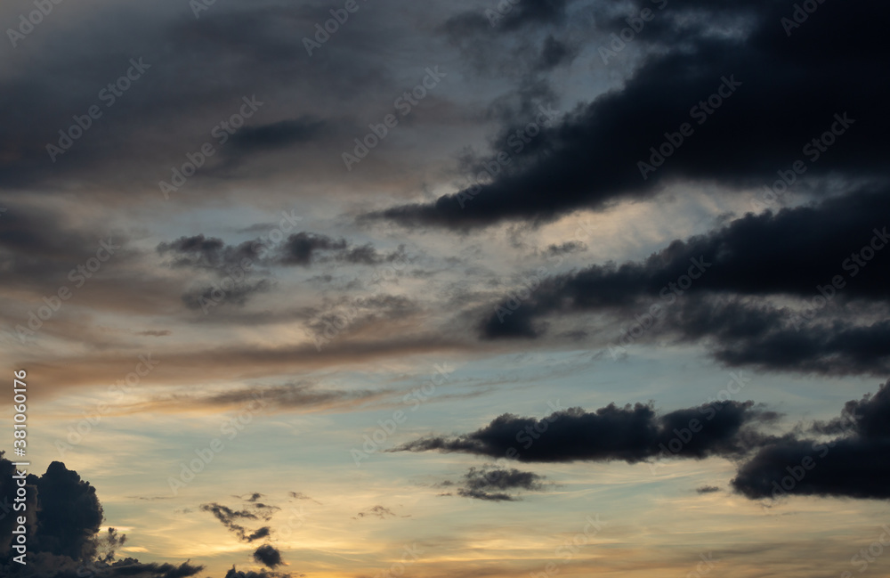 Beautiful sunset sky above clouds with dramatic light Beautiful sunset sky above clouds with dramatic light