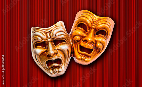 Comedy and Tragedy theatrical venetian mask with red theater curtain