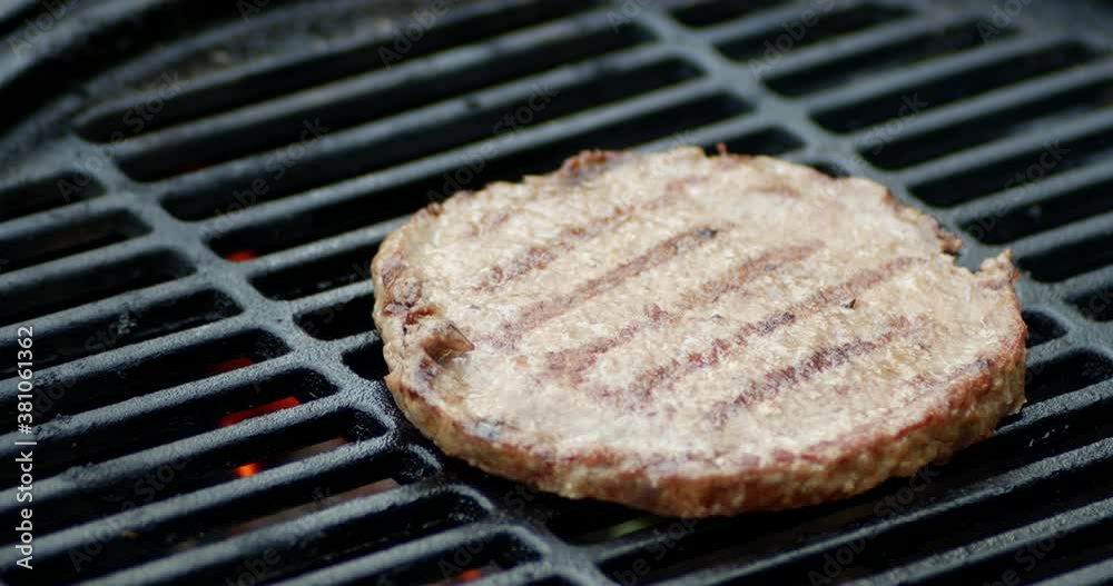 Juicy grilled beef burger with smoke. Juicy grilled beef burger with smoke.