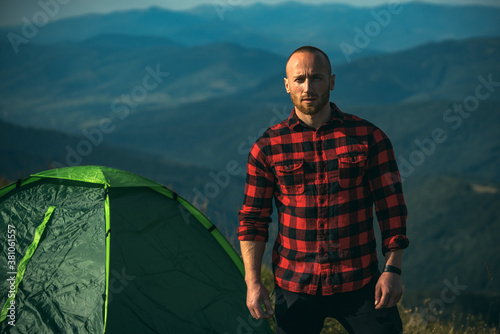 Man on camping. Trekking  travel and tourism concept.