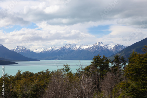 Trees and lake in front of mountains at Los Glaciares National Park in Argentina
