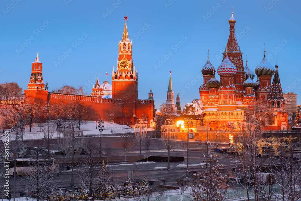 Moscow Kremlin. Red Square in capital of Russia. St. Basil's Cathedral on a winter morning. Excursions in winter Moscow. Snow on red square. Panorama of Kremlin. Russian city in snow.