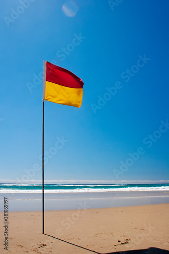 Lifesaving flag. Swimming flag on Australian beach