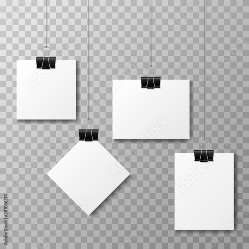 Set of binder clips on a piece of paper on a transparent background. Clerical clothespin vector illustration with shadow