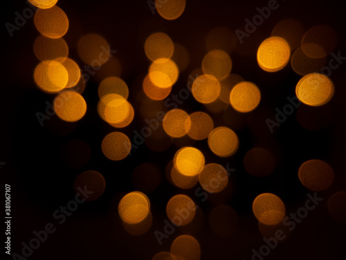 The bokeh background image is shining golden in the night and luxury.