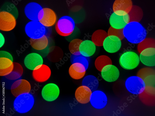 The bokeh background image is shining in the night and many colorful.