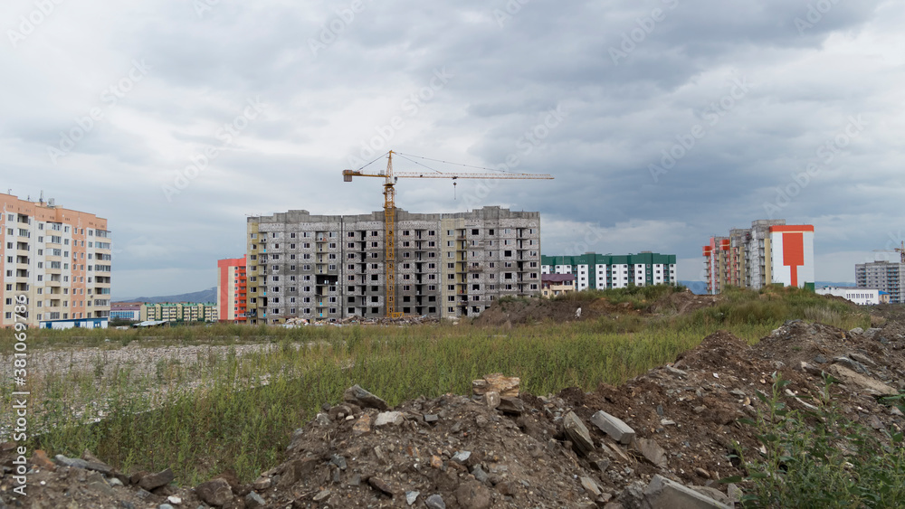 Fototapeta premium Apartment buildings under construction. New residential area. Modern architecture. Ust-Kamenogorsk (Kazakhstan)