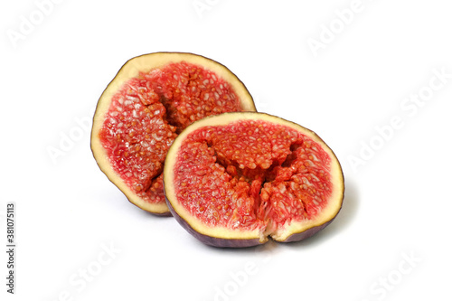 Fresh fig, Ficus carica. Halfs of ripe fruit isolated on white background