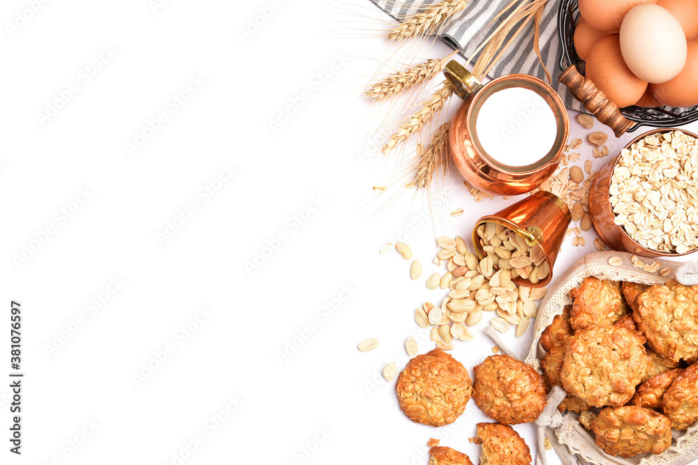 Oatmeal cookies and milk on a background with place for text. Healthy breakfast concept. Oatmeal cookies and milk on a background with place for text. Healthy breakfast concept.