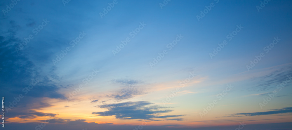 Perfect sunset sky with clouds and sun, panoramic sky background