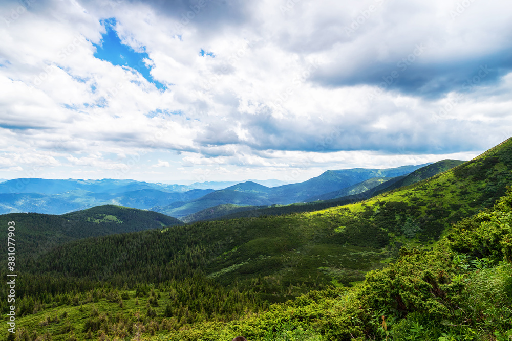 Fototapeta premium Beautiful mountain landscape with low clouds. Tourism. Travels.