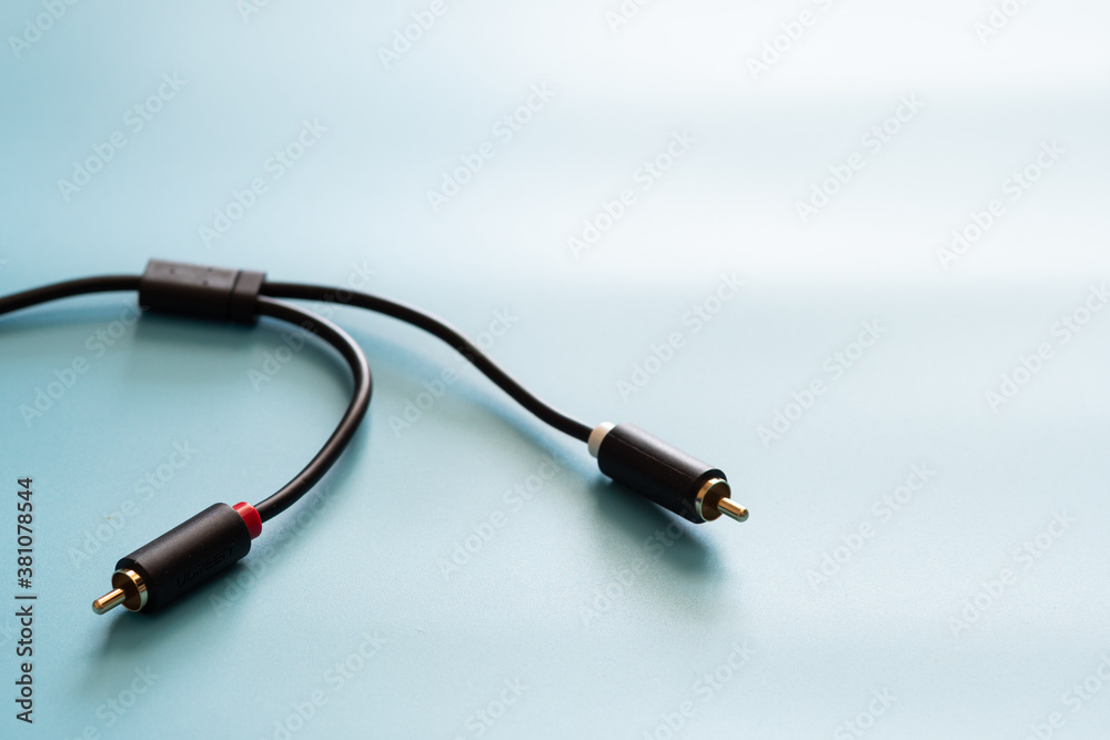 AV splitter cable connector and copy space on blue background color mood and tone style AV splitter cable connector and copy space on blue background color mood and tone style