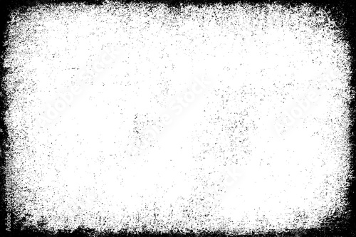 The grunge texture is black and white. Monochrome abstract background. Pattern of scratches, chips, and paint strokes. Black smudges, scuffing, wear and tear