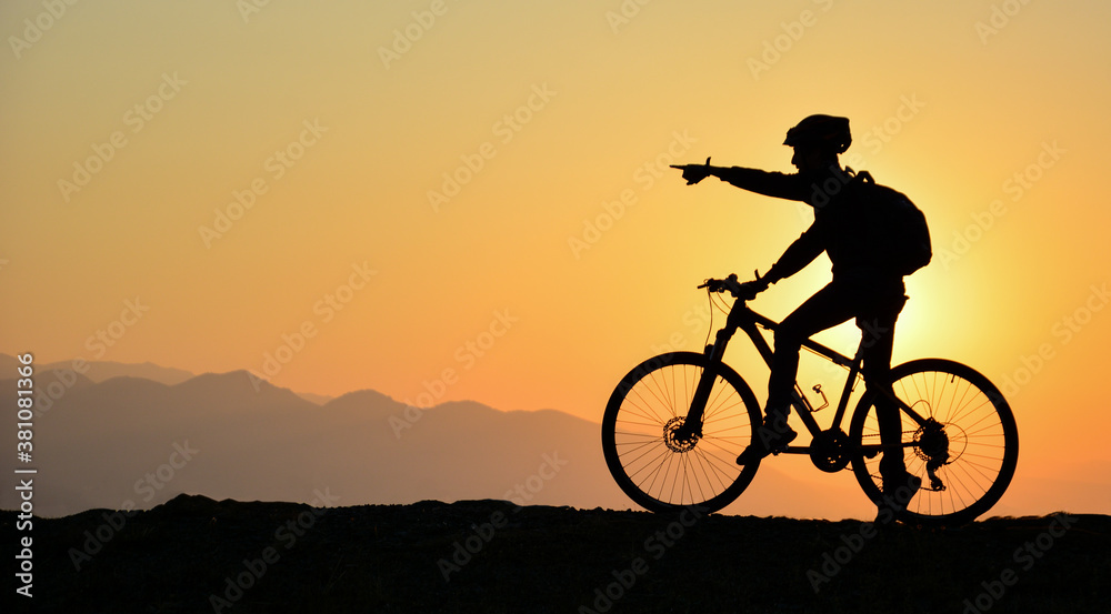 silhouette of a cyclist silhouette of a cyclist