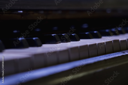 Music concept. Black and white keys of an ancient piano keyboard