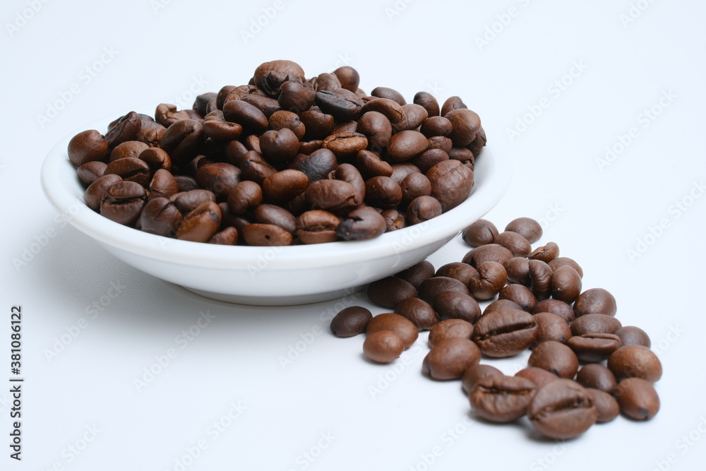 Set of fresh roasted coffee beans isolated on white background Set of fresh roasted coffee beans isolated on white background