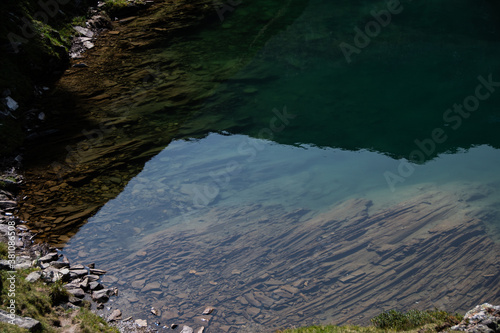 Fototapeta Naklejka Na Ścianę i Meble -  Clear water in the mountain lake 