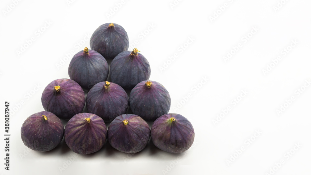Fototapeta premium Ripe fresh figs close up, top view
