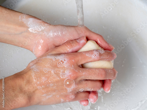 hand washing with soap. Concept of personal hygiene  countering viruses and microbes