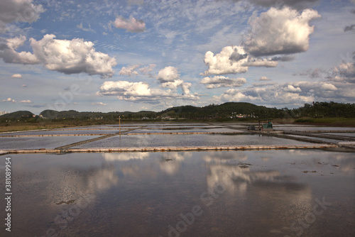 It is a picture of a salt field in the west sea, and the blue sky is very nice.