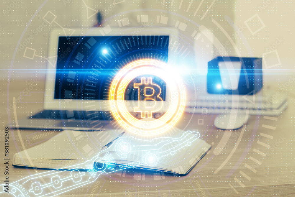 Double exposure of blockchain theme hologram and table with computer background. Concept of bitcoin crypto currency. Double exposure of blockchain theme hologram and table with computer background. Concept of bitcoin crypto currency.
