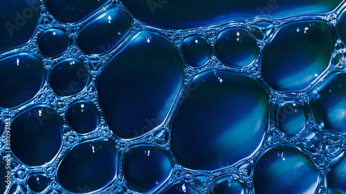 Natural texture of soap foam bubbles super macro closeup. Cool polygon geometric 3d pattern background. Sientific cell tissue molecular texture wallpaper. Hexagonal blue network structure. photo