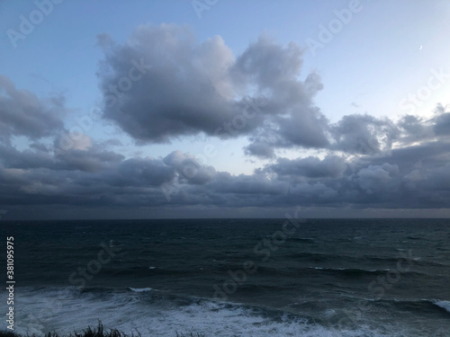 storm clouds over sea © lex