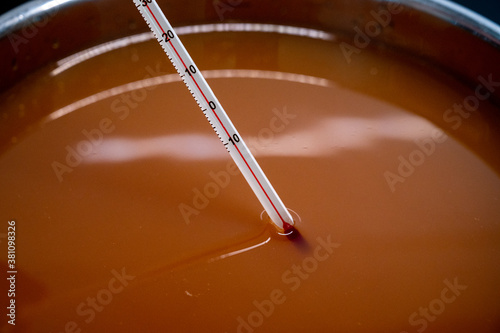 pasteurization of apple juice which is heated when freshly pressed photo