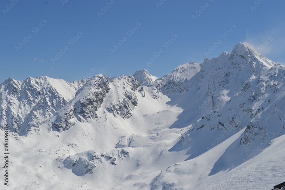 Skiing and snowboarding in the Jasna and Zakopane ski resorts between Poland and Slovakia in the Tatra Mountains