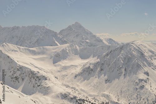 Fototapeta Naklejka Na Ścianę i Meble -  Skiing in the Jasna and Zakopane ski resorts in the Tatra Mountains between Poland and Slovakia