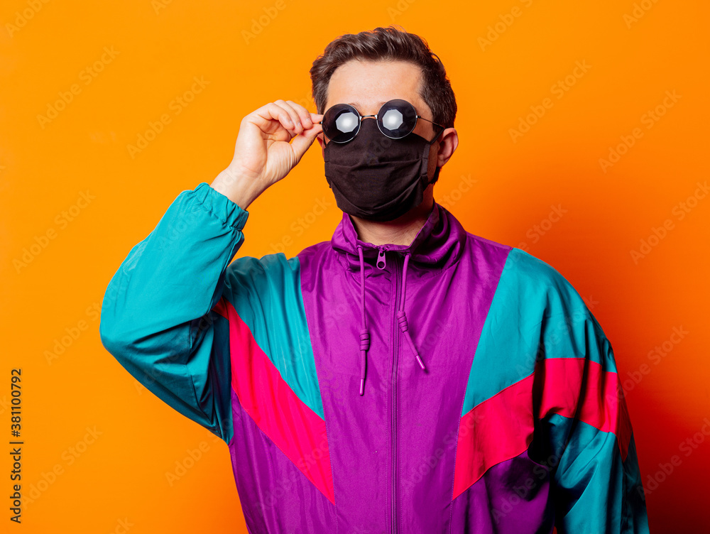 Fototapeta premium Style man in face mask, sunglasses and 80s tracksuit