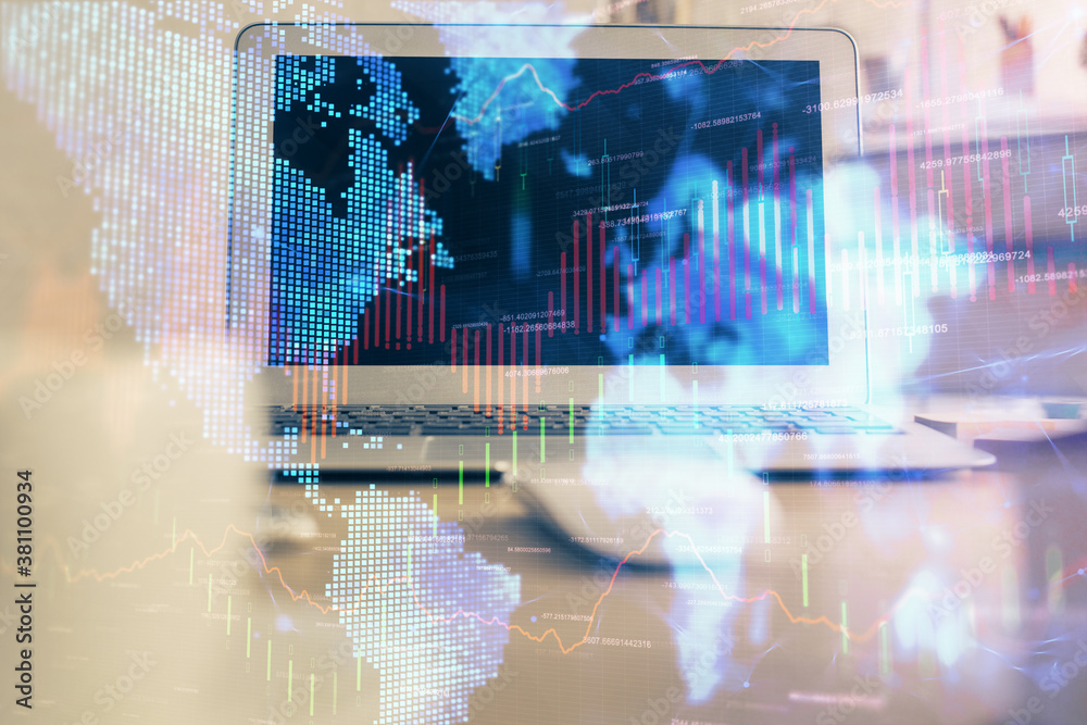 Forex market graph hologram and personal computer on background. Multi exposure. Concept of investment.