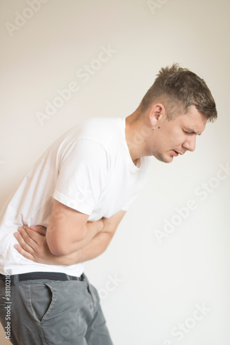A guy with stomach ache