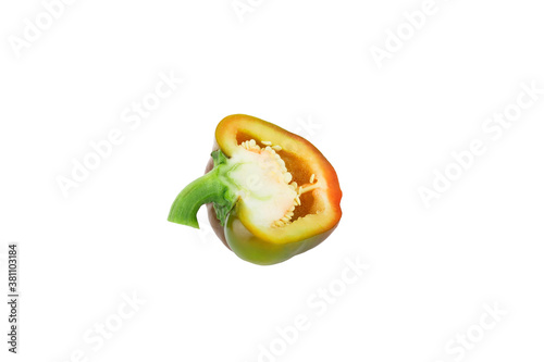 Red and green raw bell pepper, white background