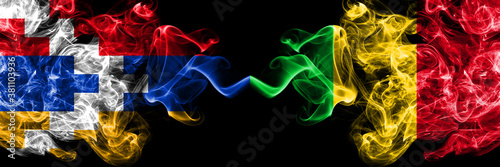 Nagorno-Karabakh, Artsakh vs Mali smoky mystic flags placed side by side. Thick colored silky abstract smoke flags