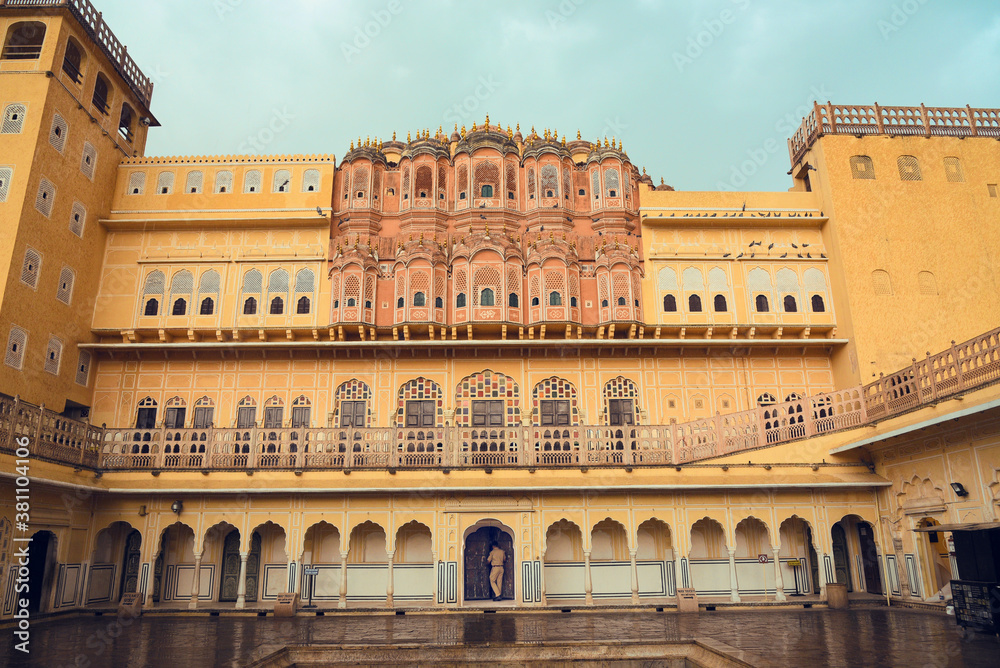 Hawa Mahal or Palace of winds or breeze, honeycomb construction, ancient building tourist destination  Jaipur, Rajasthan, North India. Historical monument  of red and pink sandstone for royal women 