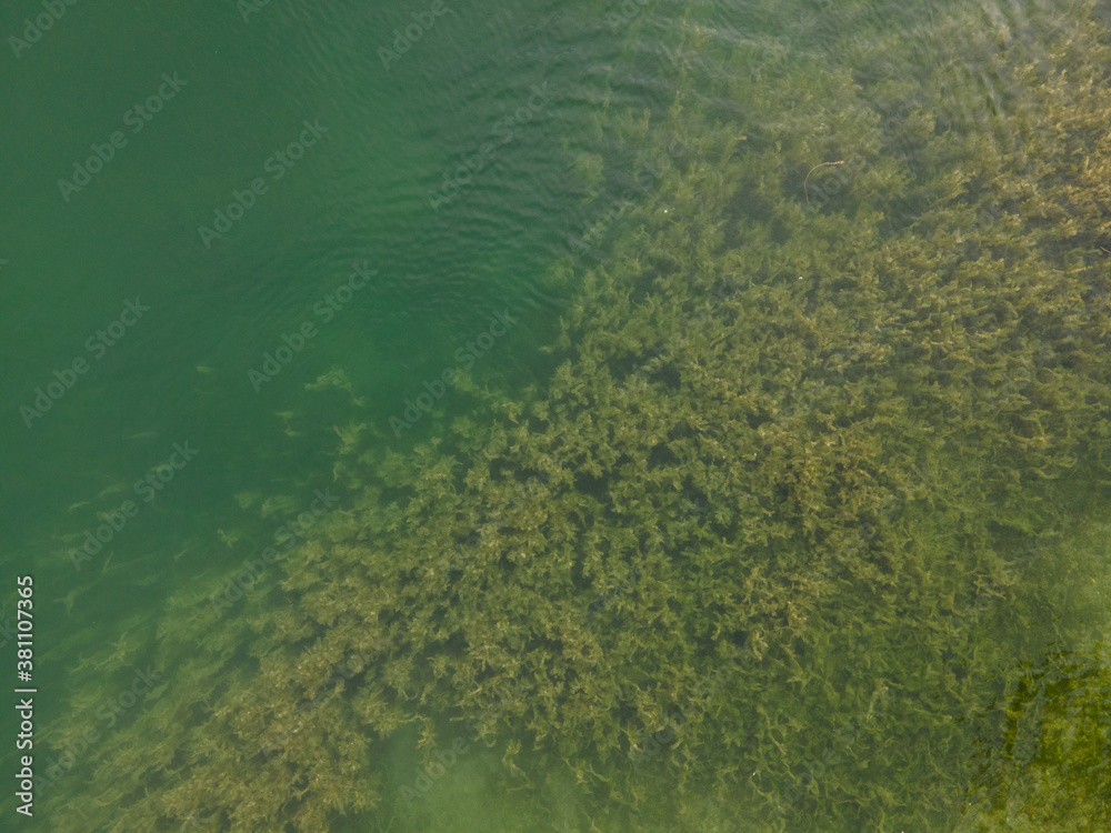 Drone shot over water. Background of lake. Birds view. Copy Space