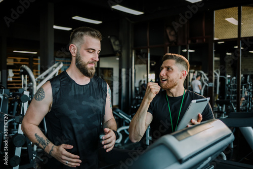 Indoor personal cardio training in gym photo