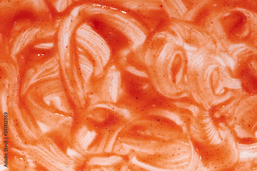 Tomato ketchup sauce on a white background. Spots and stripes ketchup texture Tomato ketchup sauce on a white background. Spots and stripes ketchup texture