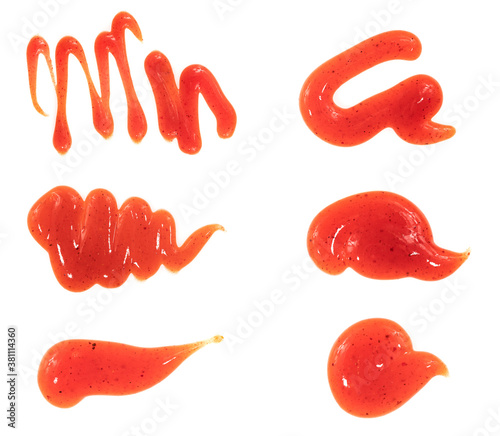 Tomato ketchup sauce isolated on a white background. Spots and stripes ketchup texture