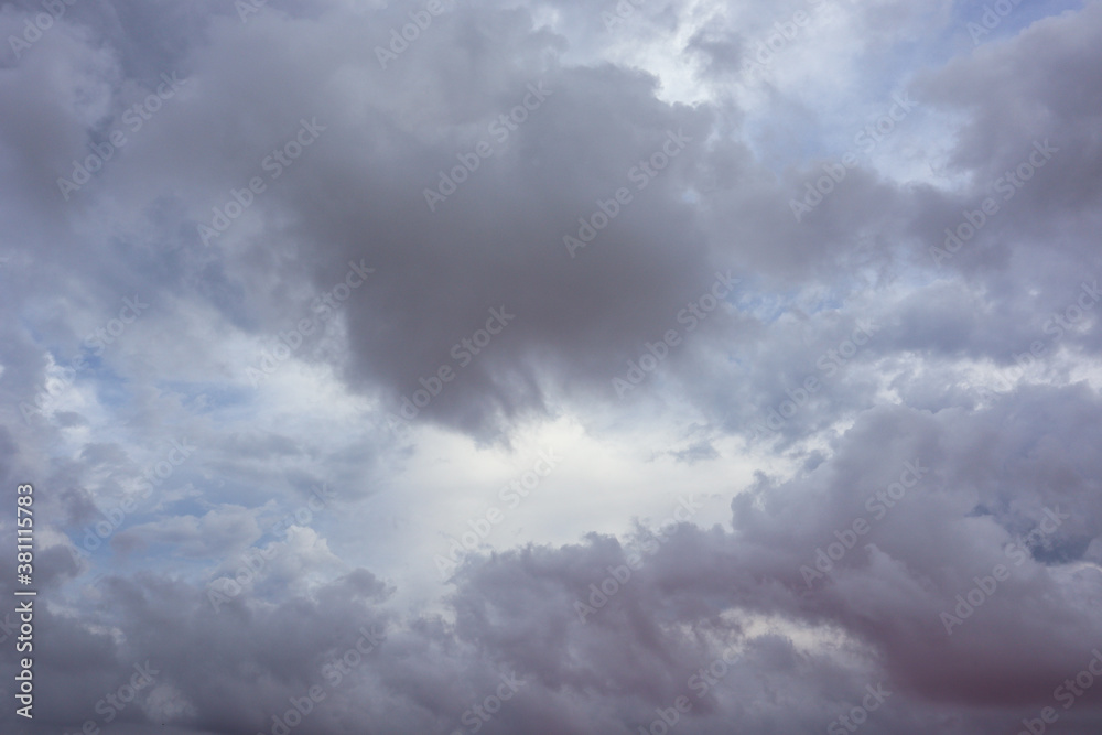 Grey purple high layered grey epic clouds on sky. Heaven cloudscape air view