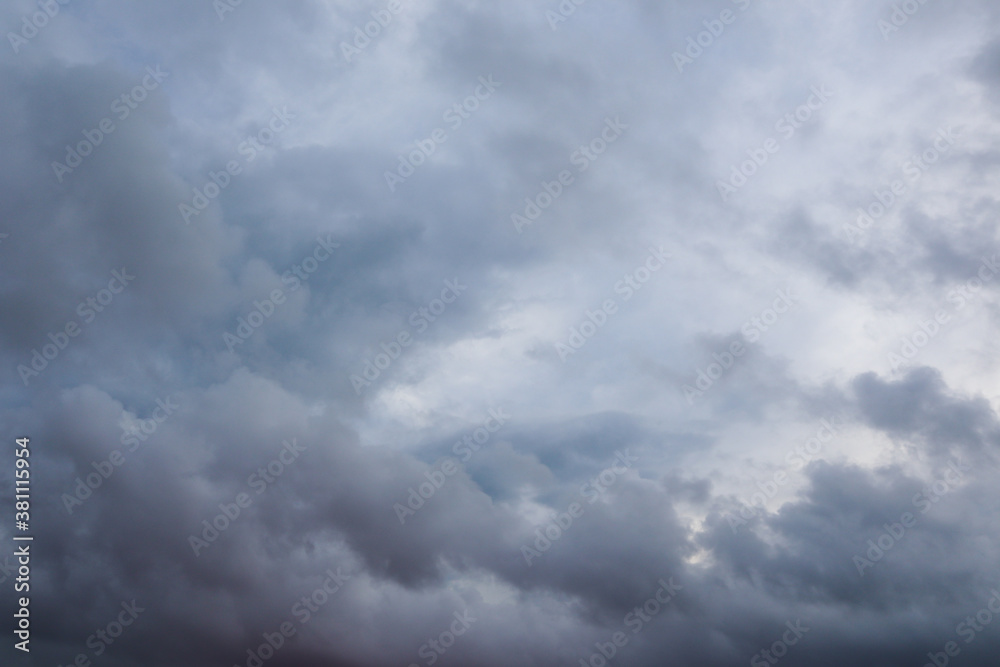 Grey high layered grey epic clouds on sky. Heaven cloudscape air view Grey high layered grey epic clouds on sky. Heaven cloudscape air view