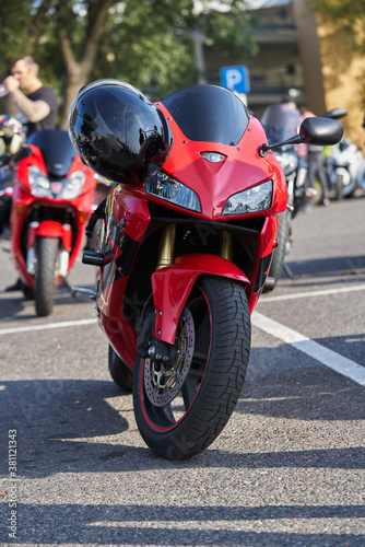 Tableau sur toile vertical photo of modern sportbike. Red sportbike. Red motorcycle