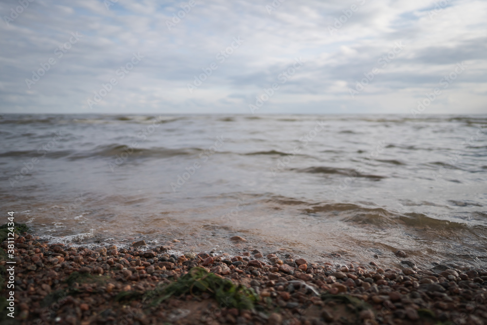 gulf of finland beach with shallow water on a cloudy day